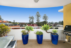 image of balcony off living room of holiday apartment manly