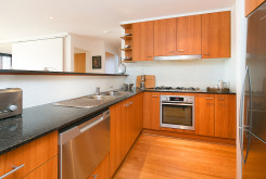 image of kitchen of holiday apartment manly